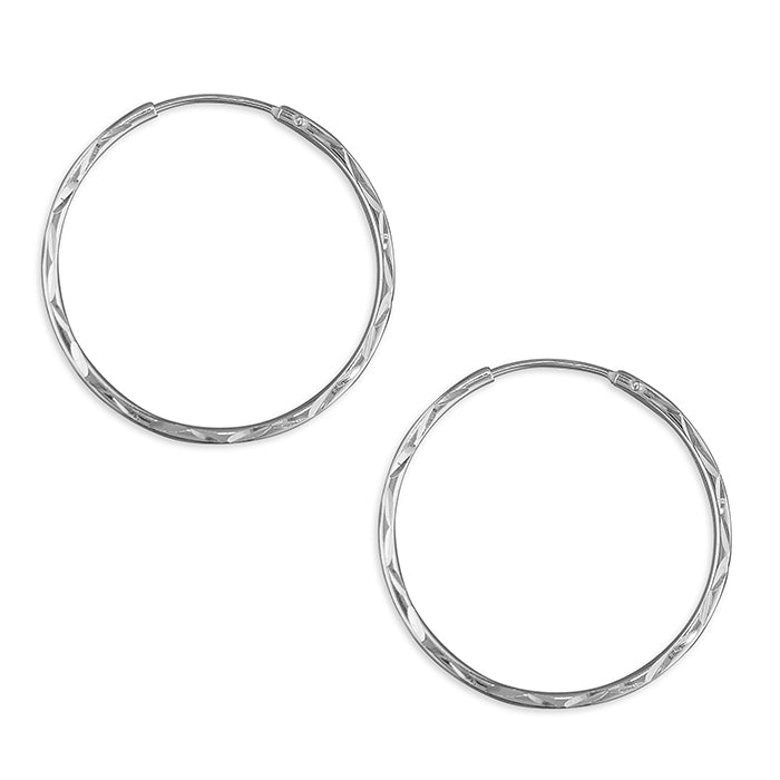 Silver hinged wire diamond cut hoop earrings complete with presentation box