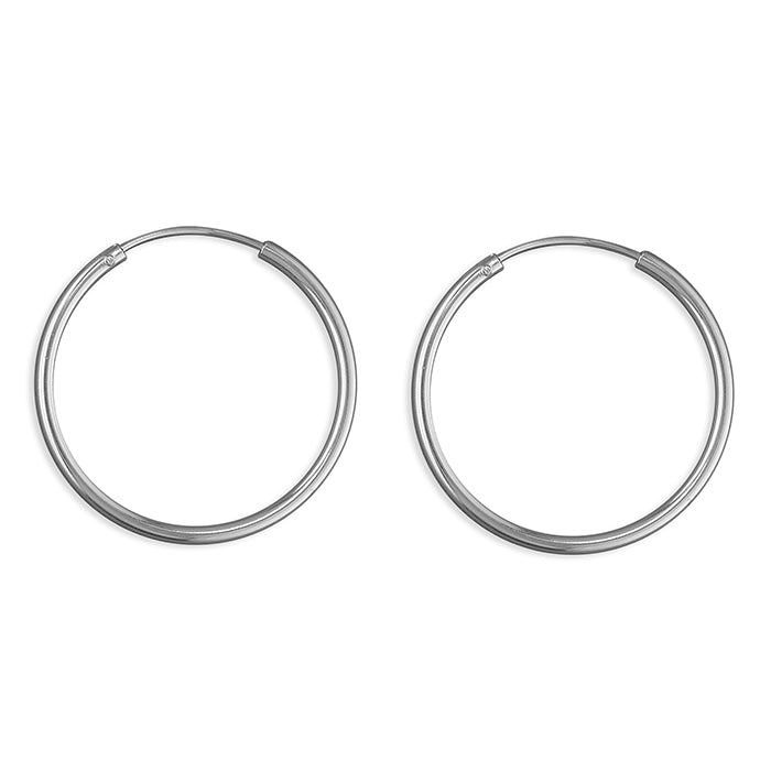 Silver hinged wire hoop earrings complete with presentation box