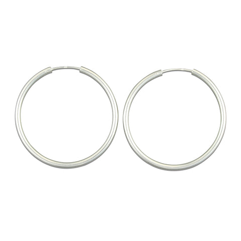 Silver hinged wire hoop earrings complete with presentation box
