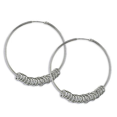 Silver hinged wire hoop earrings complete with presentation box