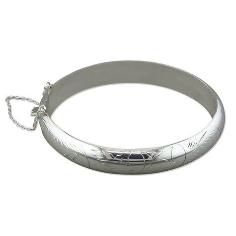 Silver engraved hinged bangle complete with presentation box