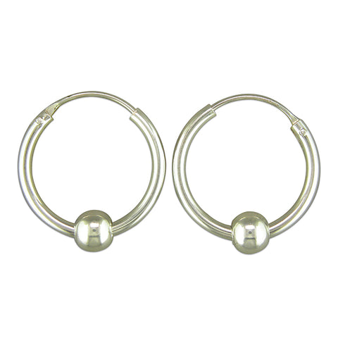 Silver hinged wire hoop and ball earrings complete with presentation box