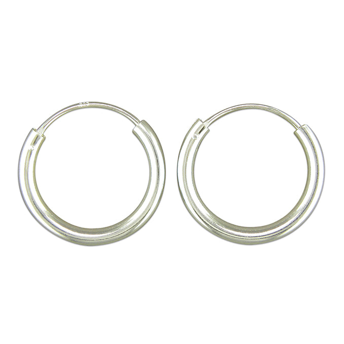 Silver hinged wire hoop earrings complete with presentation box